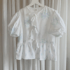 Blouse met striksluiting