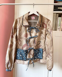 Blouse jas met striksluiting